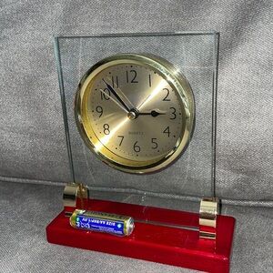 NWT.  Quartz Clock mounted in clear glass.